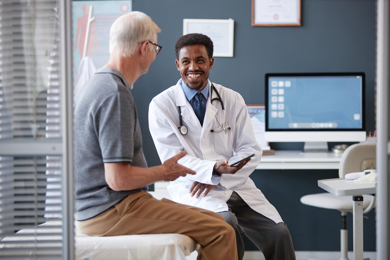 Doctor talking with a patient
